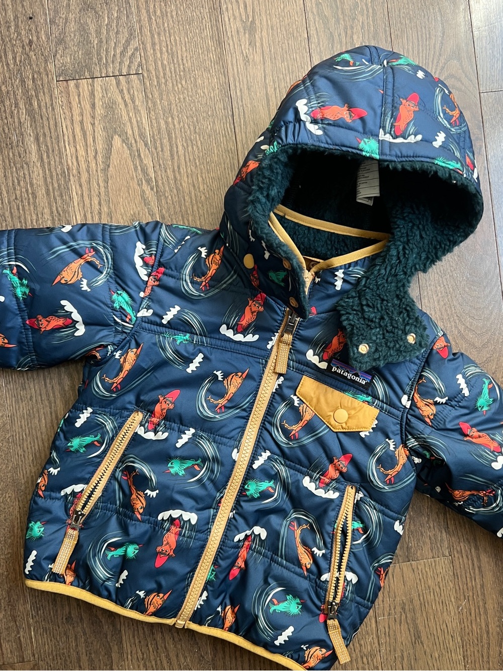 Patagonia Navy Surf Print Reversible Tribbles Jacket with hood size 2T